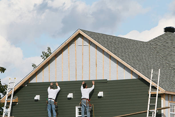 Professional Siding technician working in Newville, PA
